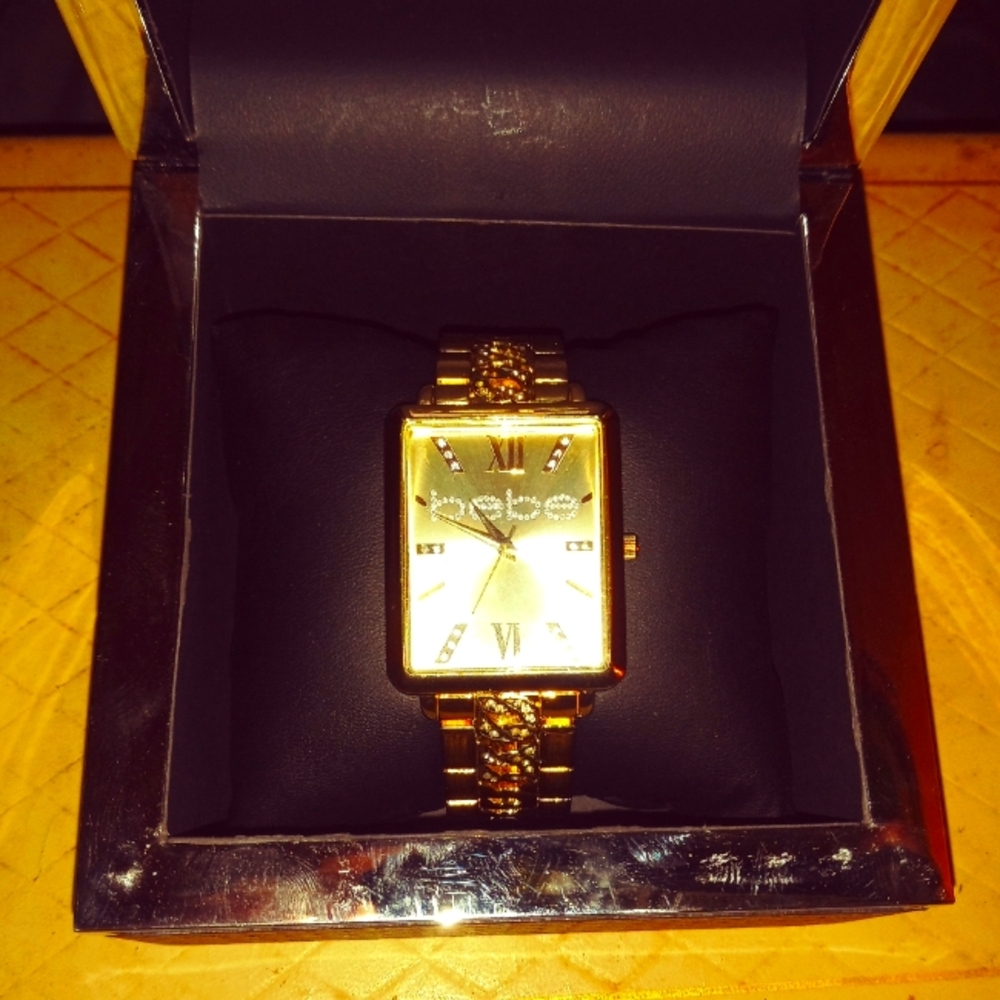 Gold BEBE watch